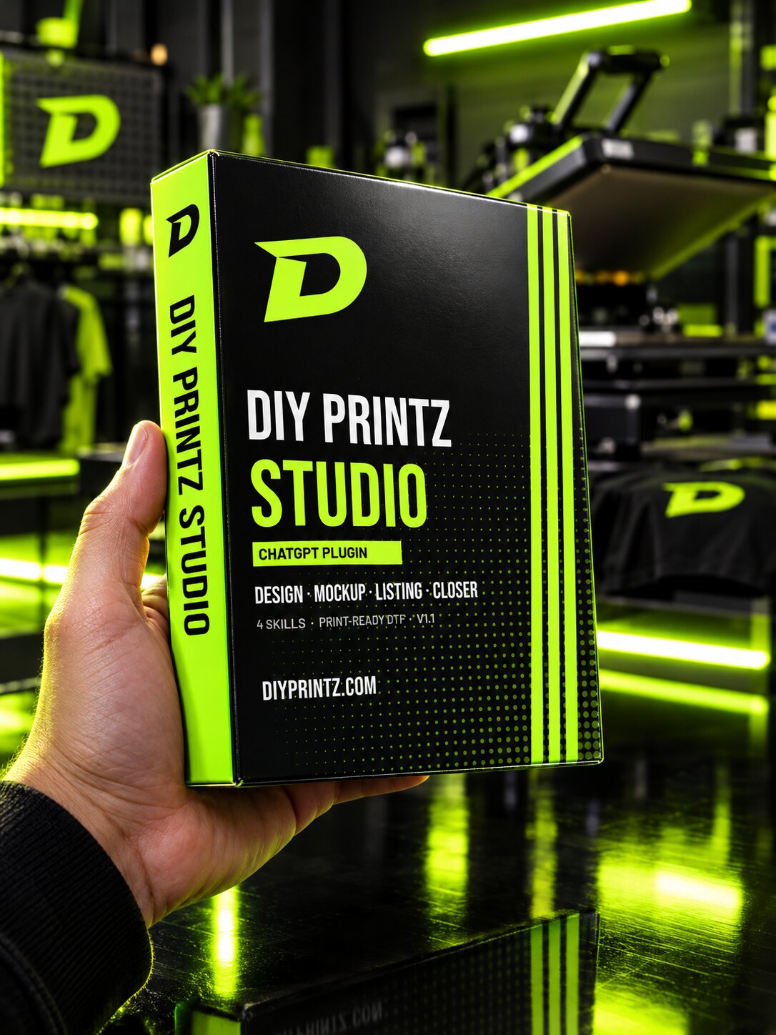 Hand holding the DIY Printz Studio plugin box in a print shop